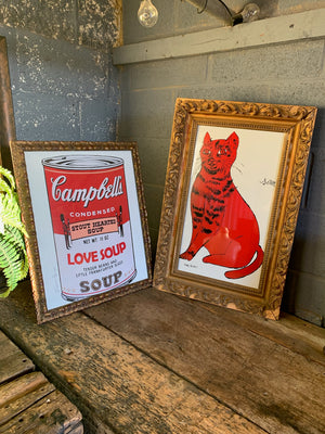 A framed and glazed Warhol print - "Campbell's soup can" - in an antique frame