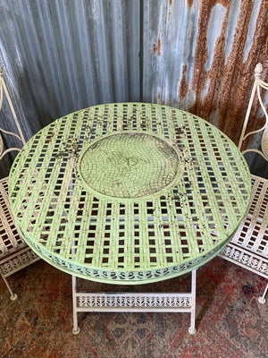 A lattice design garden table and chairs set