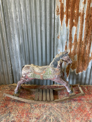 Carved wooden rocking horse