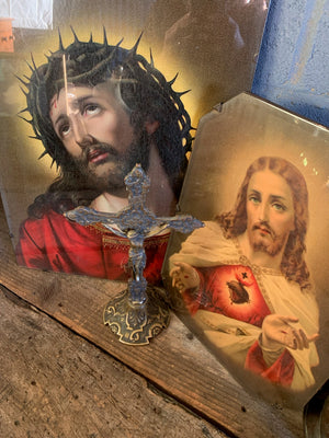 An early-20th Century framed print of the Jesus Christ Sacred Heart depiction