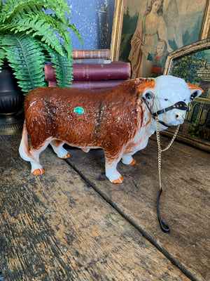 A large ceramic Hereford bull by Nelson Pottery