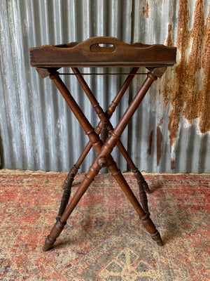 An oak butler's tray table