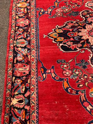 A very large rectangular red ground Persian floral rug ~ 12ft x 8ft