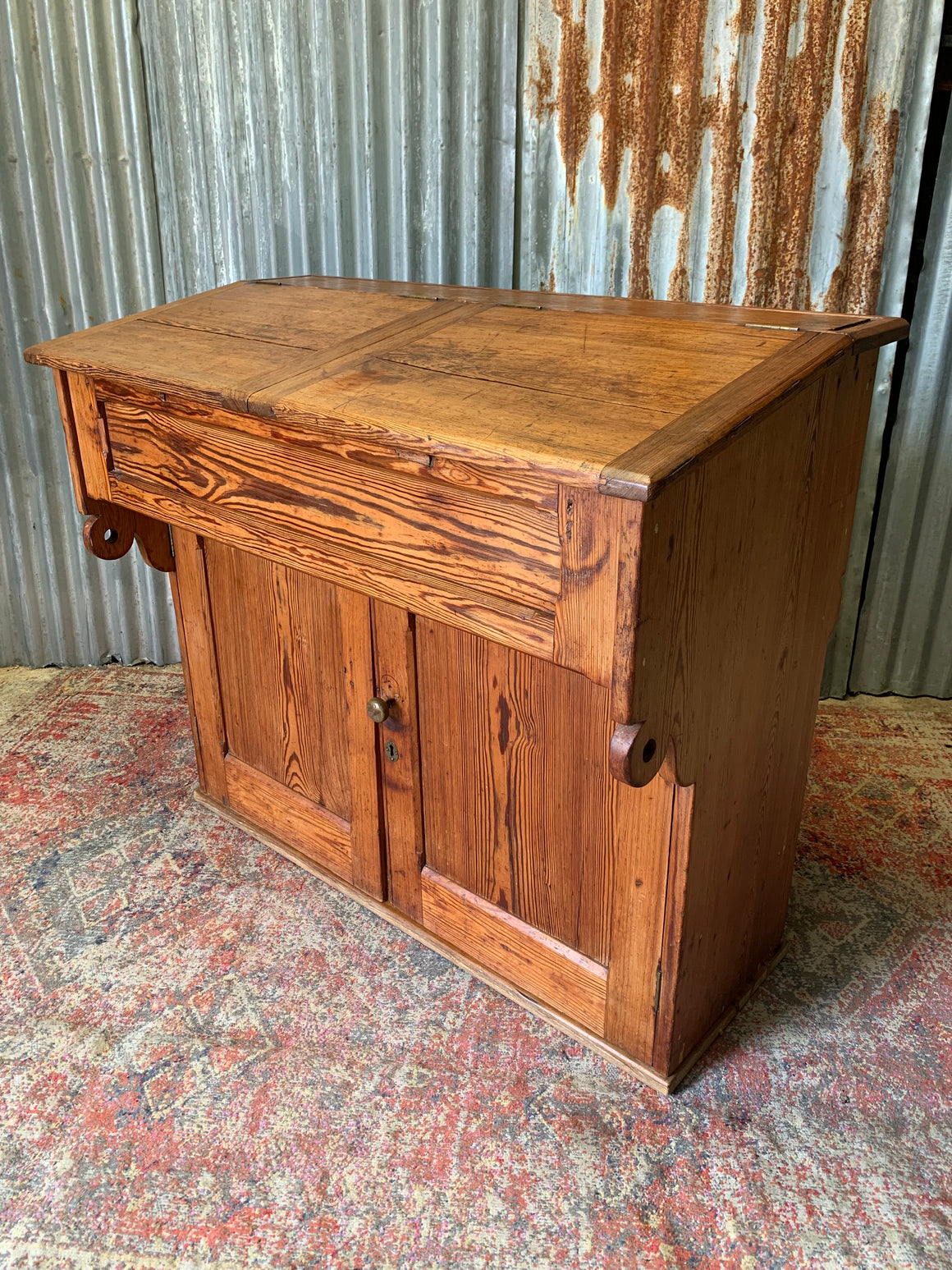 A pine double lectern standing desk