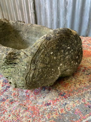 A pair of cast stone faux bois trough planters