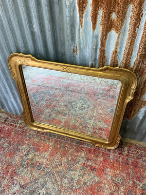 A large giltwood wall mirror