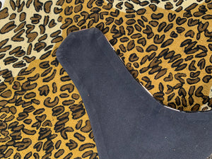 A Liberty of London faux leopard skin rug