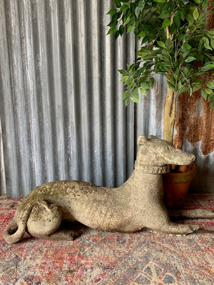 A large Austin & Seeley greyhound garden statue