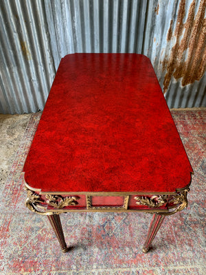 A red lacquer continental table