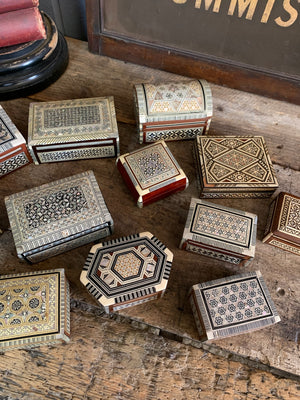 A collection of 12 mother of pearl inlaid Syrian boxes