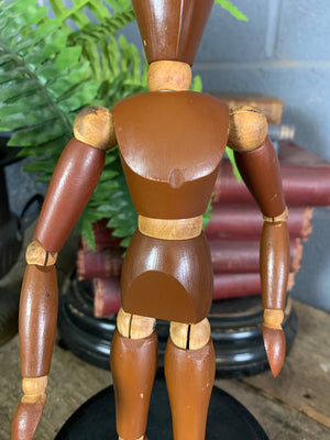 A two tone wooden artist's lay figure