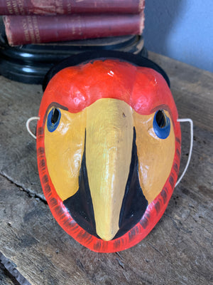 A Ukrainian papier-mâché mask of a macaw