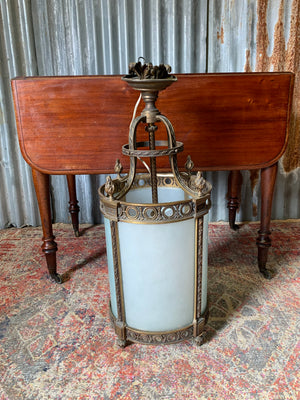 A bronze and glass hall lantern