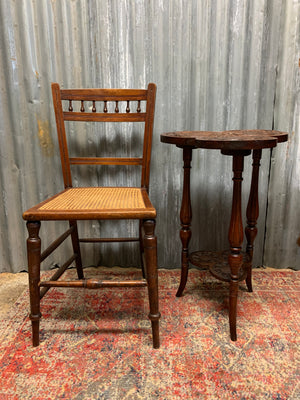 A carved mahogany occasional table with trefoil cloverleaf top