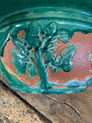 A large Chinese green glaze clay jardiniere