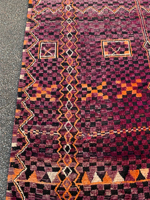 A very large purple ground Berber rug ~ 415cm or 14ft