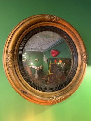 A large Regency giltwood convex mirror