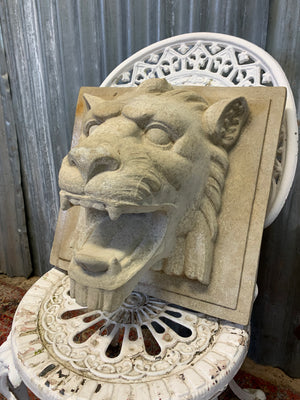 A cast stone roaring lion head fountain plaque - 37cm