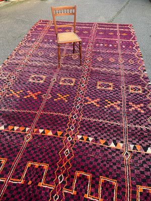 A very large purple ground Berber rug ~ 415cm or 14ft