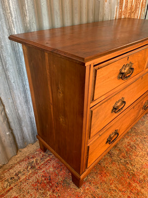 An Art Nouveau chest of drawers