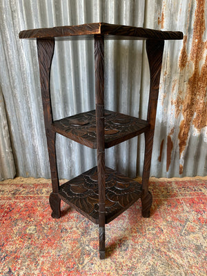 A Japanese carved three tier side table for Liberty London