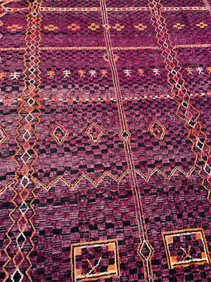 A very large purple ground Berber rug ~ 415cm or 14ft