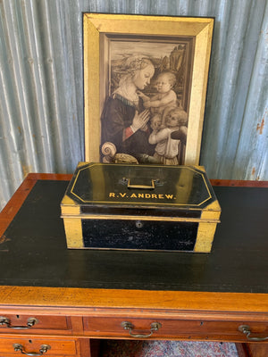 A Victorian black metal strong box with lock and key