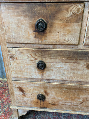 A pine chest of two over two drawers