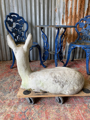 A large deer or fawn garden statue