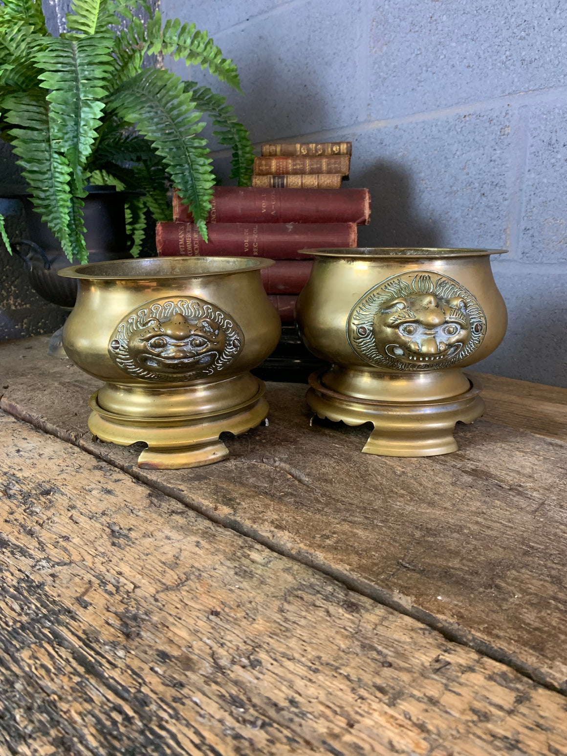 A pair of Asain bronze jardinieres on stands