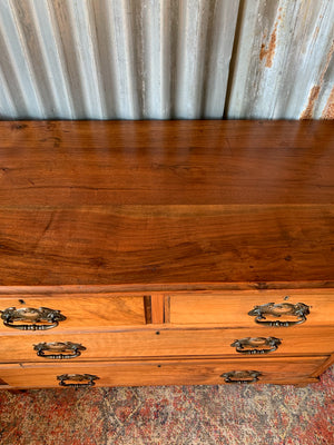 An Art Nouveau chest of drawers