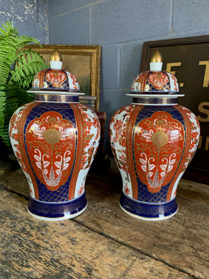 A pair of large hand-painted Japanese Imari ginger jars