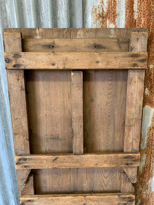 A 19th Century wooden folding trestle table