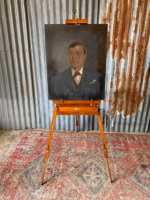 A floor-standing wooden field easel