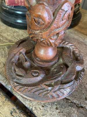A Chinese carved wooden dragon table lamp