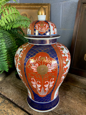 A pair of large hand-painted Japanese Imari ginger jars