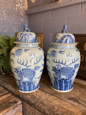 A pair of very large blue and white ginger jars