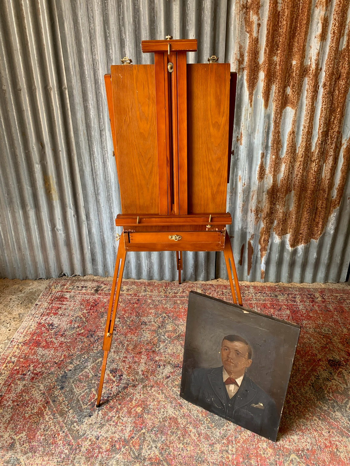 A floor-standing wooden field easel