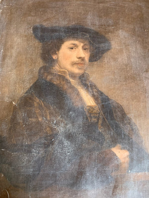 An framed oleograph of Rembrandt's "Self portrait at 34"