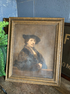 An framed oleograph of Rembrandt's "Self portrait at 34"