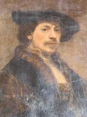 An framed oleograph of Rembrandt's "Self portrait at 34"