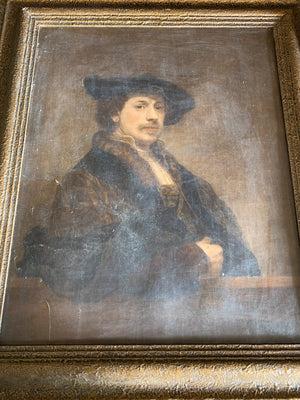 An framed oleograph of Rembrandt's "Self portrait at 34"