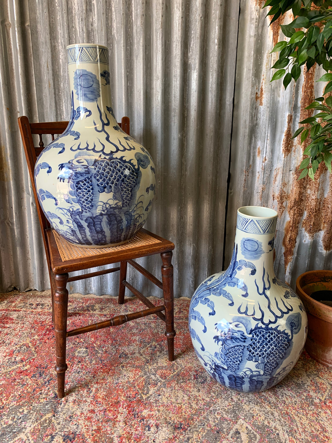 A pair of very large blue and white floor vases