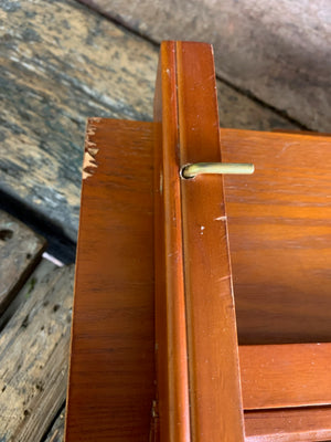 A floor-standing wooden field easel