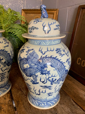 A pair of large blue and white ginger jars