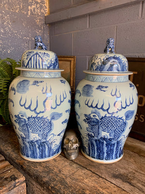 A pair of very large blue and white ginger jars