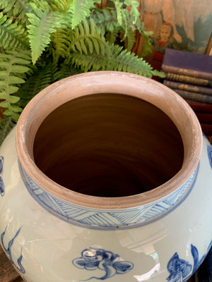 A pair of very large blue and white ginger jars