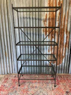 A faux bamboo metal and glass etagere