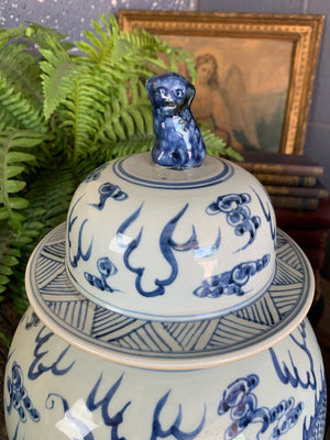 A pair of large blue and white ginger jars