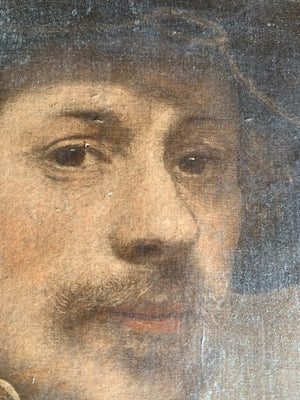 An framed oleograph of Rembrandt's "Self portrait at 34"